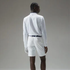 J.Lindeberg Tyson Long Sleeve Golf Polo Shirt -Golf Sporting Goods Store J.Lindeberg Tyson LS Reg Fit Polo GMJT07801 0000 SHLIN154 WhiteNavy Peony Model 3