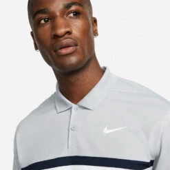 Nike Dry Victory Colourblock Golf Polo Shirt -Golf Sporting Goods Store Nike SS22 Dry Victory Colourblock Golf Polo Shirt DH0845 077 M Smoke Grey Obsidian White model 2
